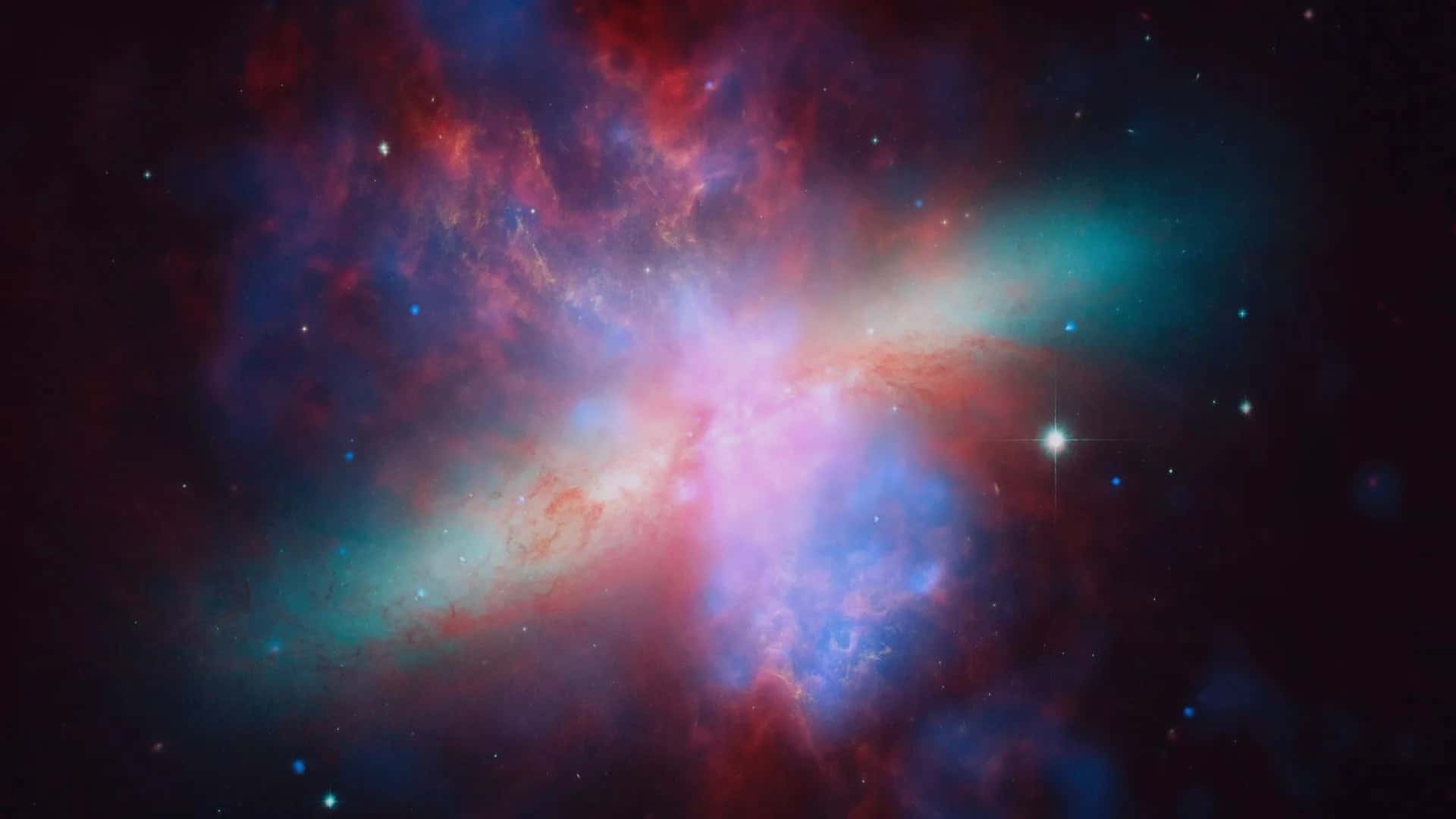 Hubble, Spitzer ve Chandra verileriyle oluşturulan Puro Galaksisi görüntüsü (NASA, ESA, STScI, JPL-Caltech, CXC)